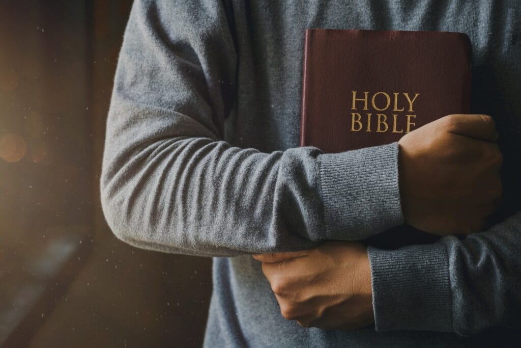 Student holding a Bible in a degree program at Cornerstone College & Seminary Certificate of Discipleship