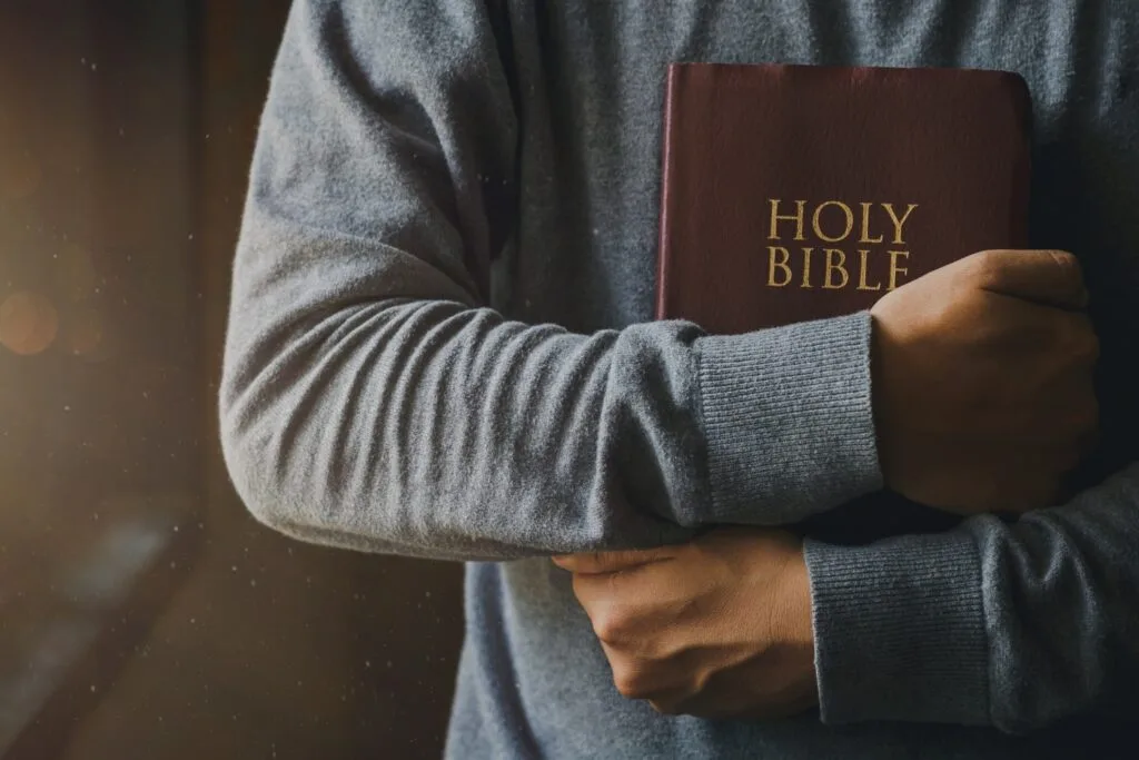 Student holding a Bible in a degree program at Cornerstone College & Seminary