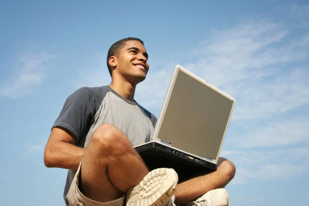 OnDemand college student studying on his laptop under a blue sky Cornerstone OnDemand  