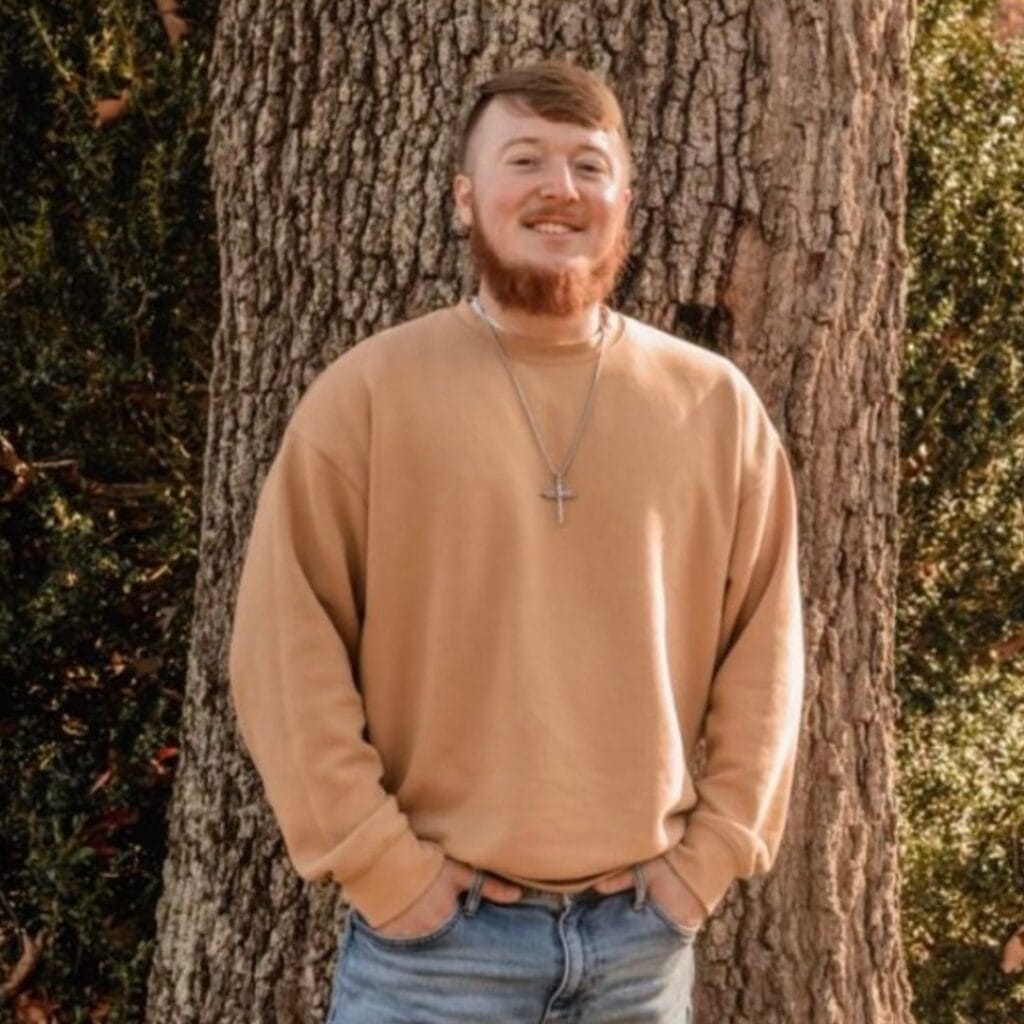 Daniel stands for his testimonial photo Daniel M.  