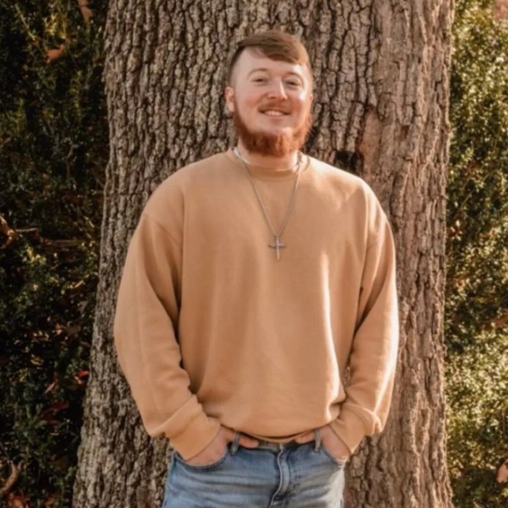 Daniel stands for his testimonial photo Daniel M.  