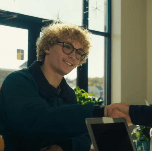 Student shaking hands at Cornerstone College & Seminary Benjamin G.  